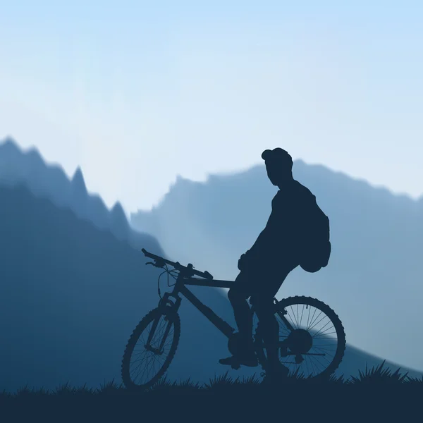 Велосипедист у горах — стоковий вектор