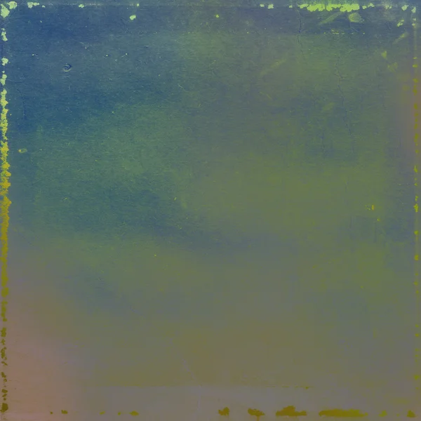 Зеленые грязные пятна на голубом винтажном фоне — стоковое фото