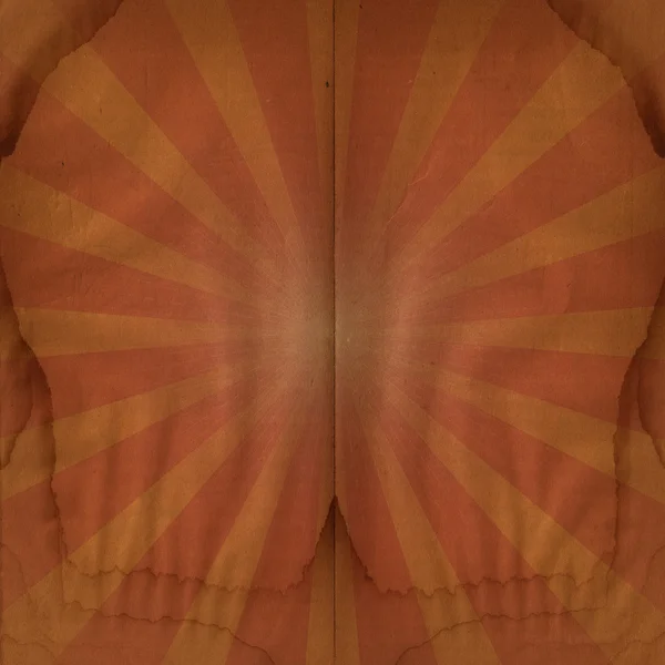 Grunge sunburst on old paper background — Stock Photo, Image