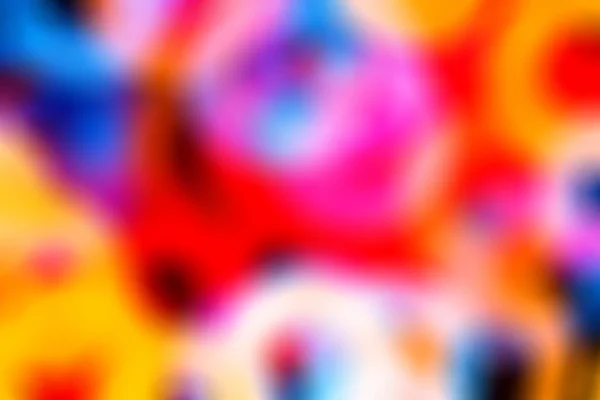 Fondo abstracto borroso con anillos de colores — Foto de Stock