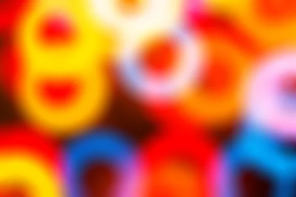 Fond abstrait flou avec des anneaux colorés — Photo