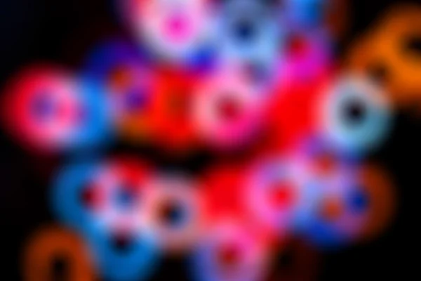 Sfondo astratto sfocato con anelli colorati — Foto Stock