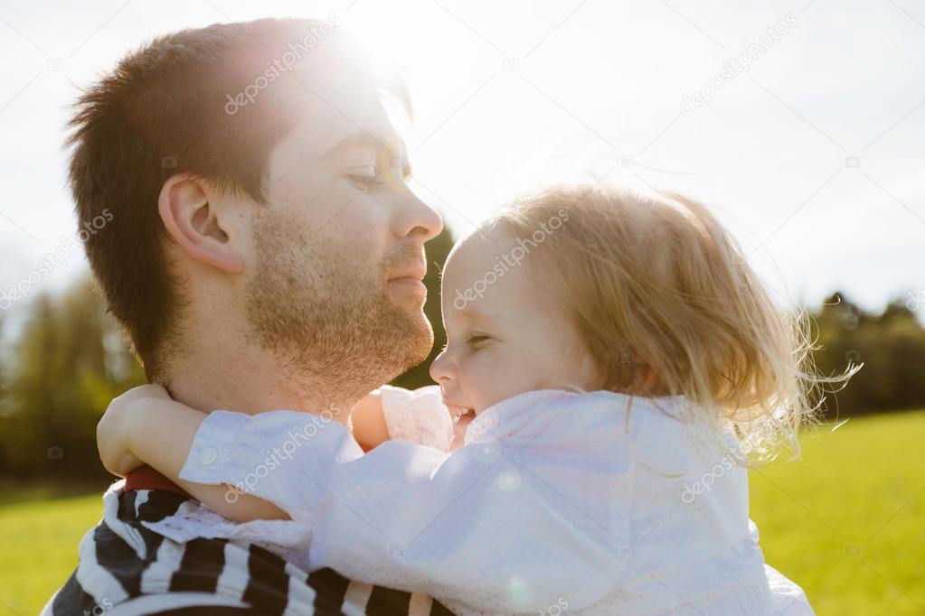 father and daughter in the park