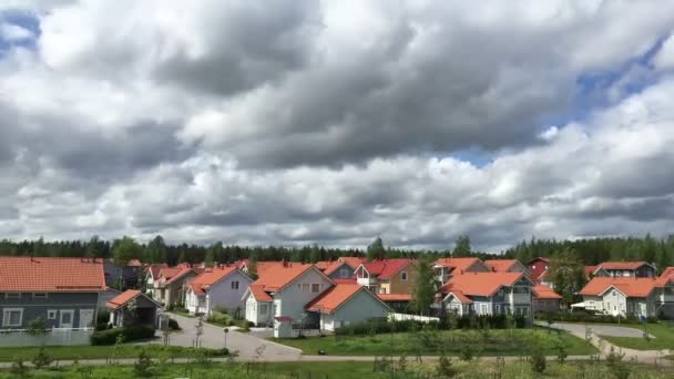 Timelapse clouds over the houses — Stock Video