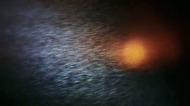Bardzo jasne światło przez odbicie pyłu na tle światła orande. — Wideo stockowe