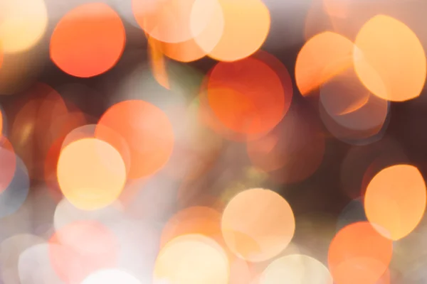 Kleurrijke bokeh lichten achtergrond close-up. — Stockfoto