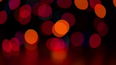 Hareketli Noel renkli bokeh ışıkları.