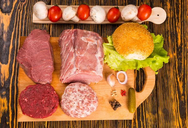 Raw lunch meat and spices for sandwich making — Stock Photo, Image