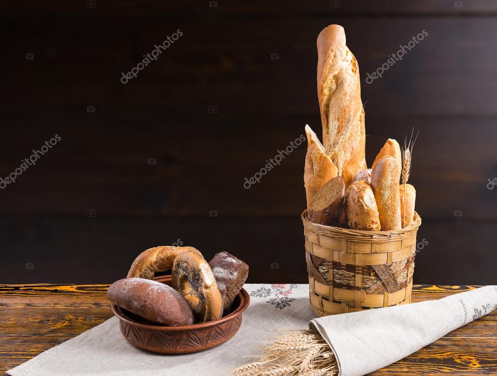 Assorted fresh bread and rolls on display Stock Photo by ©Vaicheslav