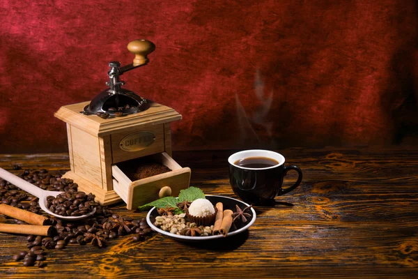 Cup of Coffee with Hand Grinder, Beans and Spices