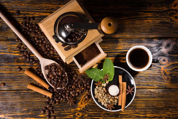 Cup of Coffee with Hand Grinder, Beans and Spices — Stock Fotó