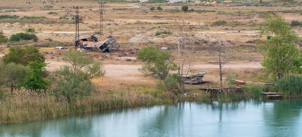 Panorama View Dilapidated Building Pylons Outbuildings Shoreline Lake River Reflections — Stock Photo, Image