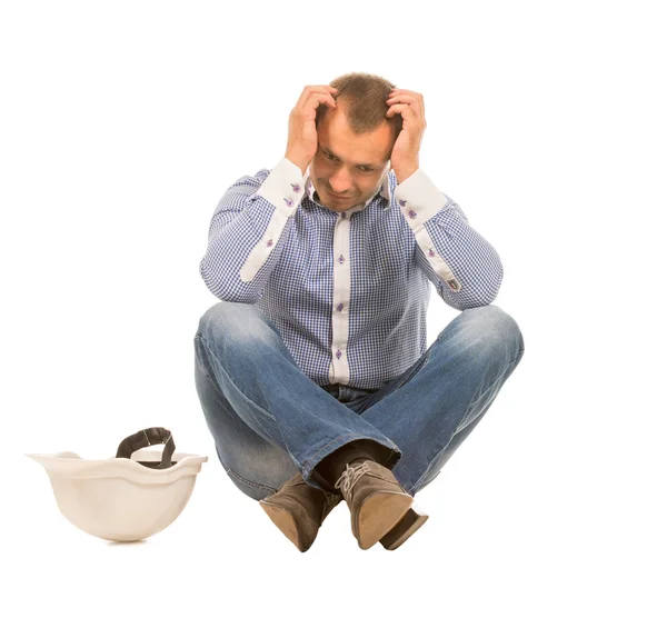 Man with Hard Hat Sitting with Head in Hands — Stock Photo, Image