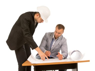 Two building contractors discussing a blueprint clipart