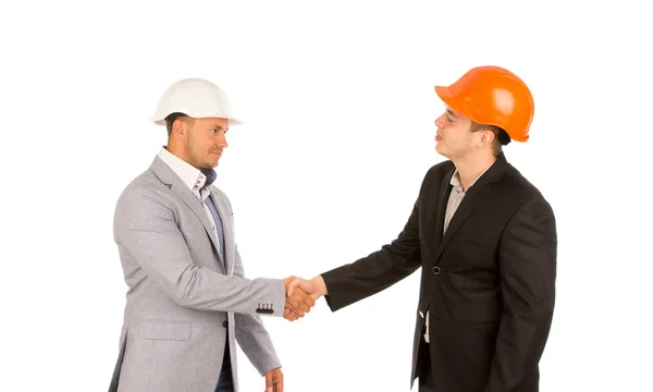 Jovem cliente apertando a mão com o engenheiro — Fotografia de Stock