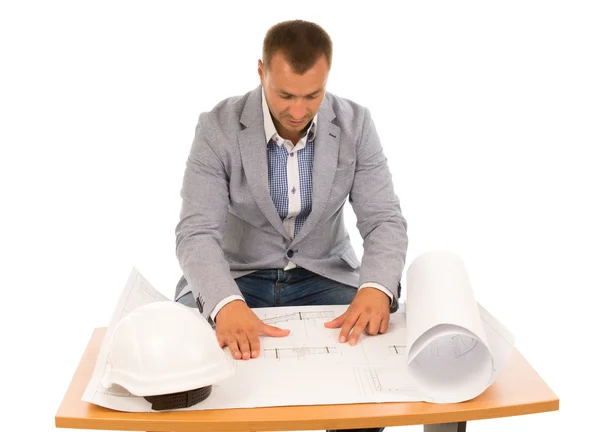 Architect checking a building plan — Stock Photo, Image