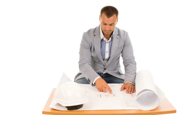 Construction foreman working on a blueprint — Stock Photo, Image