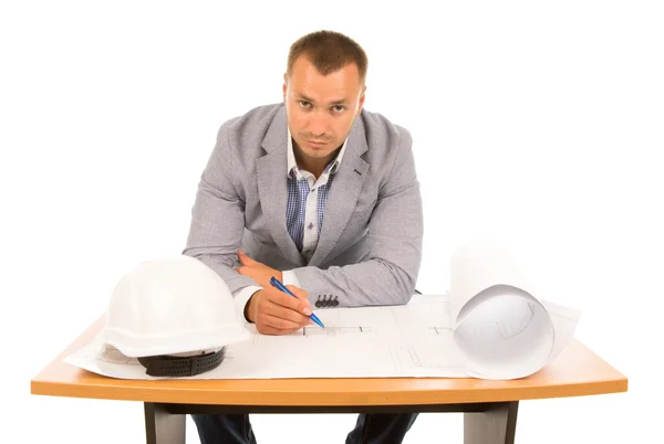 Serious architect working on a blueprint — Stock Photo, Image