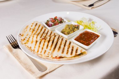 Grilled Quesadilla on Plate with Salsas clipart