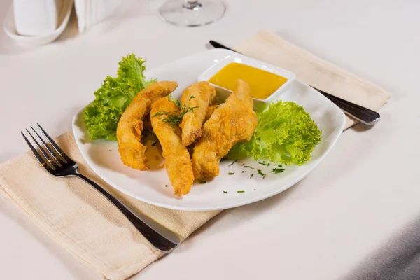 Plate of Chicken Fingers and Dipping Sauce — Stock Photo, Image