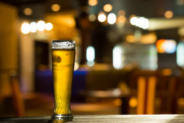 Glass of Beer on Bar Counter — Stock Photo, Image