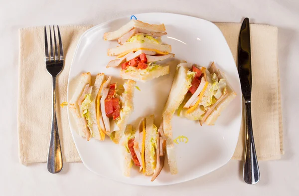 Overhead of Triple Decker Sandwich on Plate — Stock Photo, Image