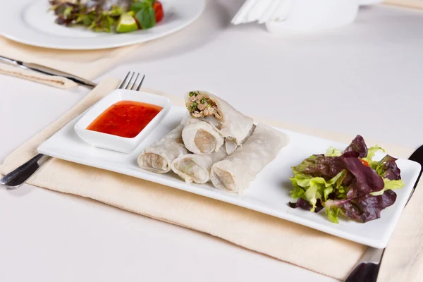 Stack of Spring Rolls with Sauce and Garnish — Stock Photo, Image