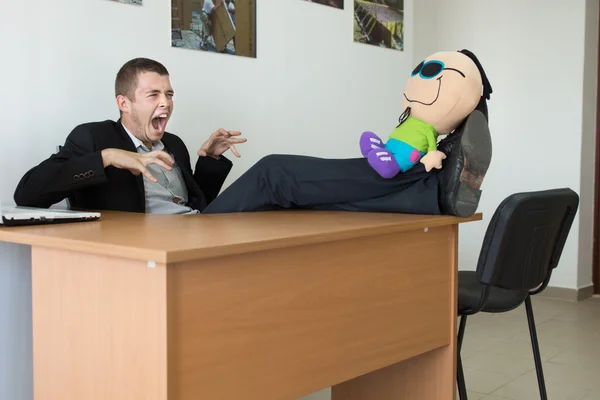 Young Office Worker Playing with Stuffed Toy — Stock Photo, Image