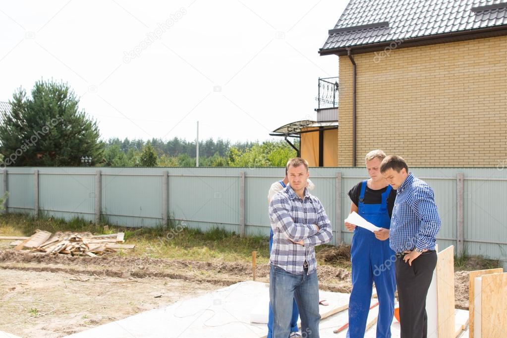 Site engineers discussing details