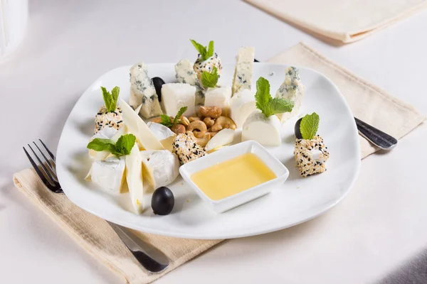 Savory appetizers with cashew nuts — Stock Photo, Image