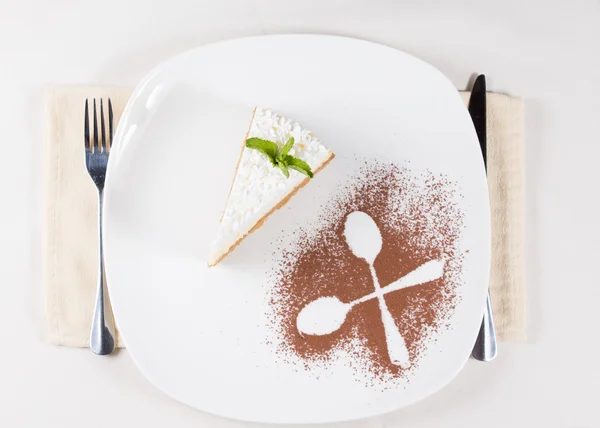 Slice of pie topped with cream served for dessert — Stock Photo, Image