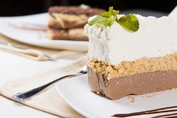 Slice of Tasty Layered Cake on White Plate — Stock Photo, Image