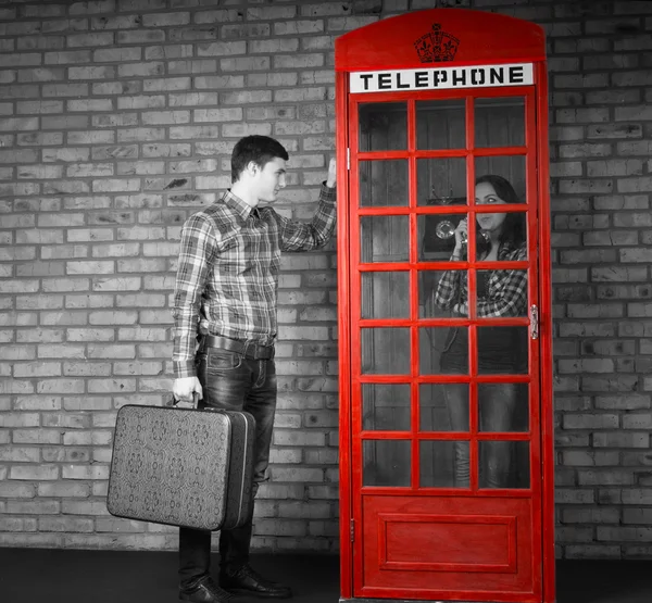 Young Man Knocking at the Telephone Booth — Stock Photo, Image