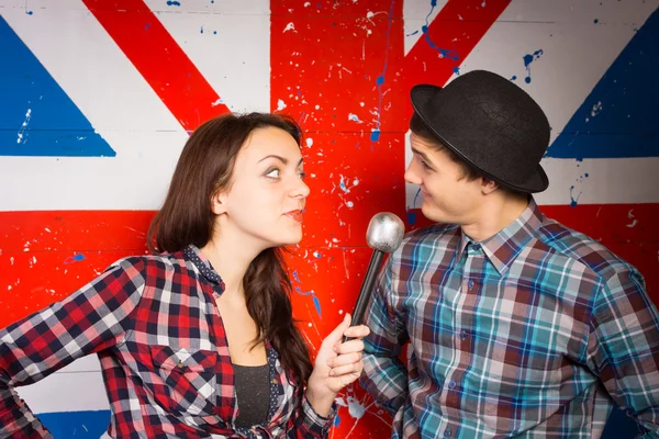 Two performers doing a British comedy show — Stock Photo, Image