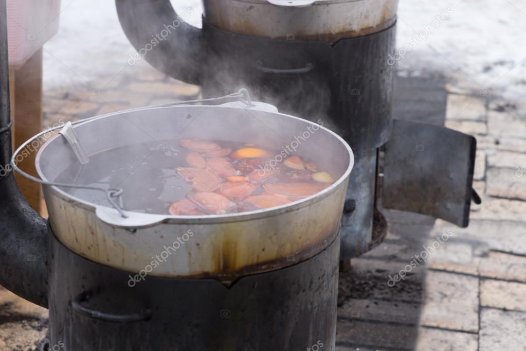 Food Cooking On An Outdoor Wood Burner Stove Stock Photo