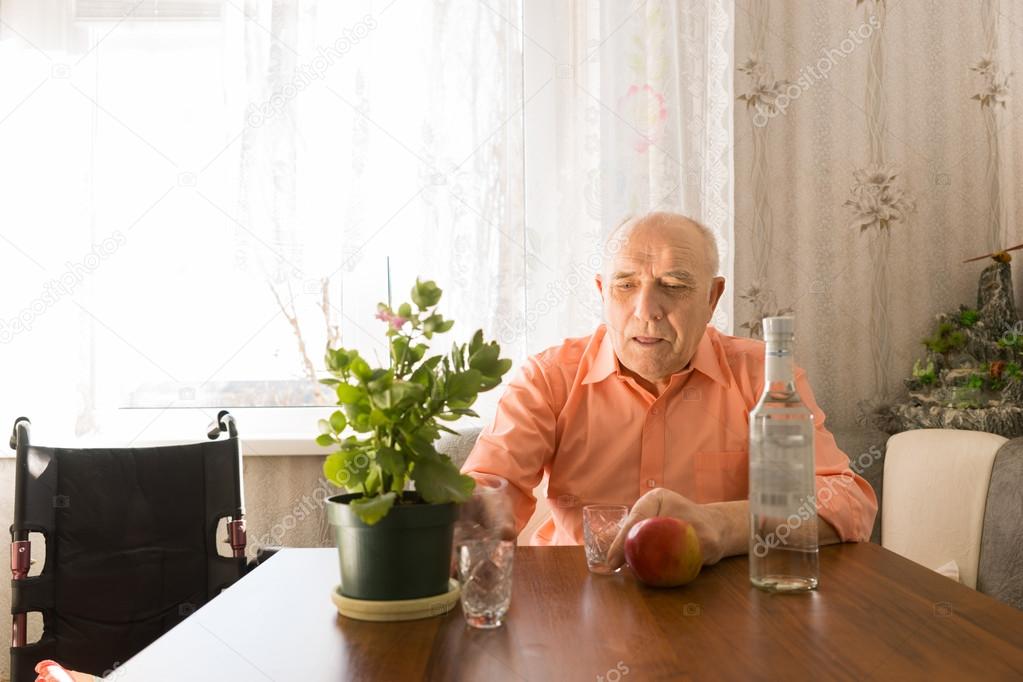 Old Man at the Table with Wine, Apple and Plant