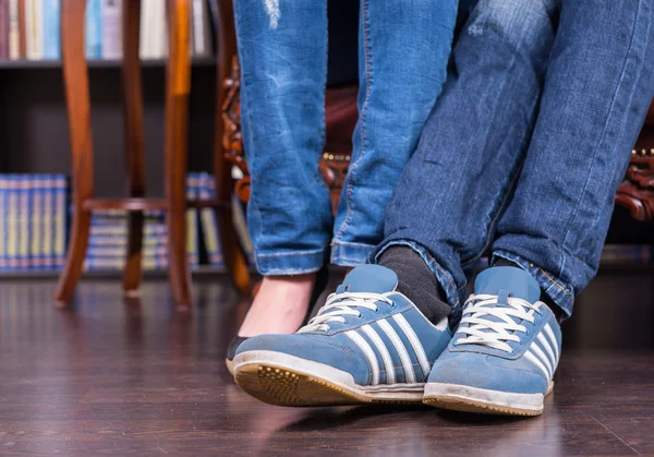 Legs and Feet of a Couple in Jeans and Shoes — Stock Photo, Image