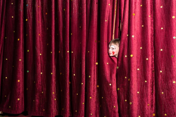 Impatient little boy on stage — Stock Photo, Image