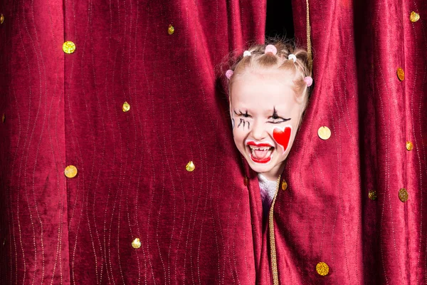 stock image Pretty excited little blond girl on stage