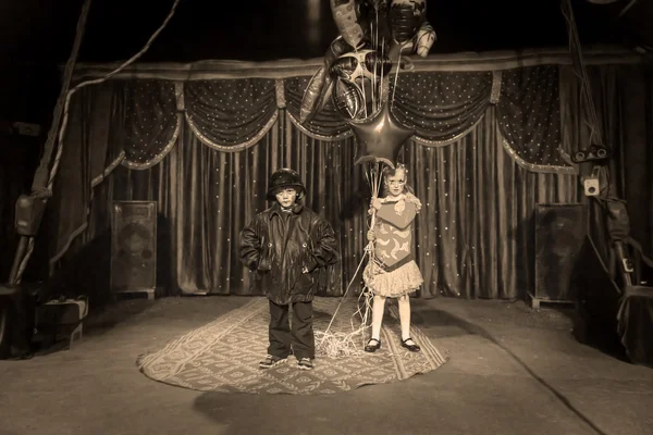 Boy Clown on Stage with Girl Holding Balloons — Stock Photo, Image