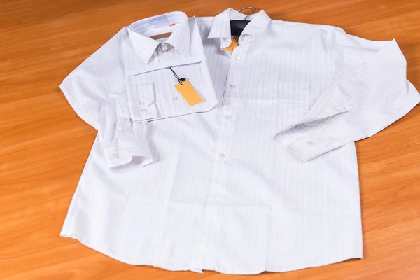 Mens White Dress Shirts Arranged on Wooden Surface — Stock Photo, Image