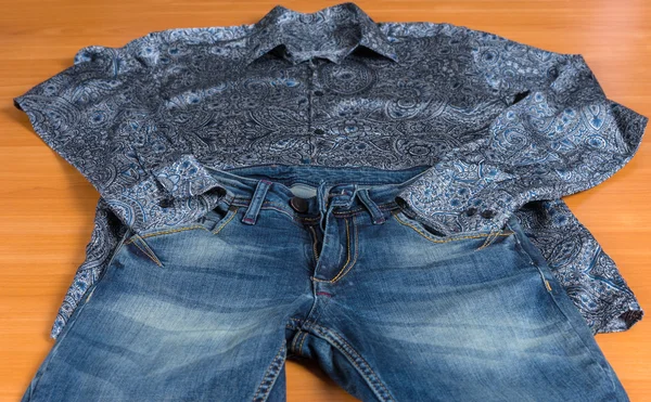 Paisley Dress Shirt and Blue Jeans Set Out to Wear — Stock Photo, Image