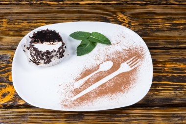 Decadent Chocolate Dessert on Plate with Mint