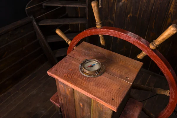 Antique Compass and Steering Wheel on Ship Deck — Stock Photo, Image