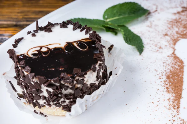 Creamy cake or mould decorated with chocolate — Stock Photo, Image