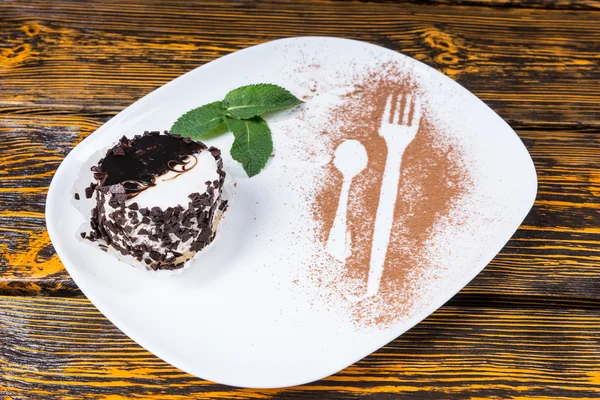 Decadent Chocolate Dessert on Plate with Mint — Zdjęcie stockowe
