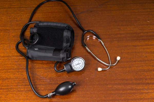 Blood Pressure Cuff and Stethoscope on Table — Stock fotografie