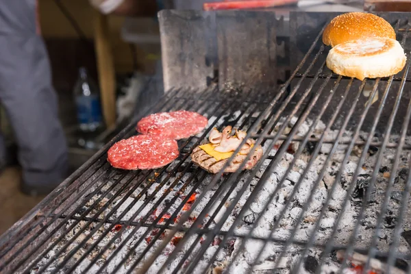 Burgers Cooking on Hot Charcoal Grill — Stok fotoğraf