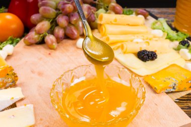 Delicious golden honey on a buffet