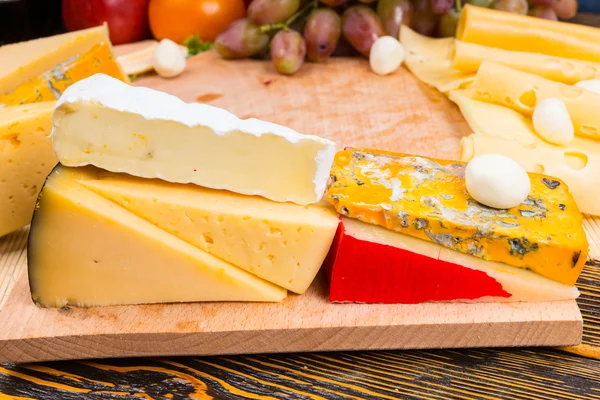 Delicious assortment of different cheeses — Stock Photo, Image